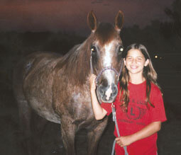 Kurin, Kim's daughter, and Ginger pose happily for the family photo album.