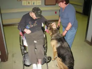 Baron visiting people in the hospital