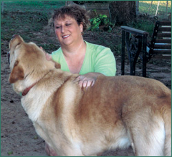 Bear pausing for a scratch behind the ears from his best buddy, Christine.